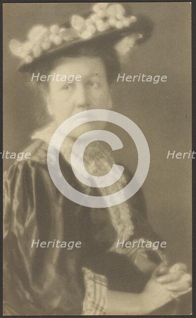 Portrait of a Woman in Hat with Dogwood Flowers, 1907-1943. Creator: Louis Fleckenstein.