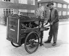 Gipsy knife-grinder with his handcart, Horley, Surrey, 1964.