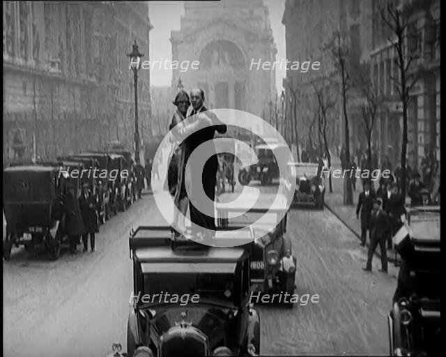 A Couple Dancing the Charleston on the Top of a Car Driving Down a London Street, 1926. Creator: British Pathe Ltd.