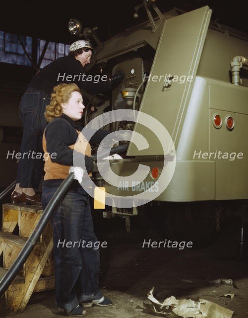 Helen Ryan, age 41 (with cap), widow and used to work..., Heil and Co., Milwaukee, Wisconsin, 1943. Creator: Howard Hollem.