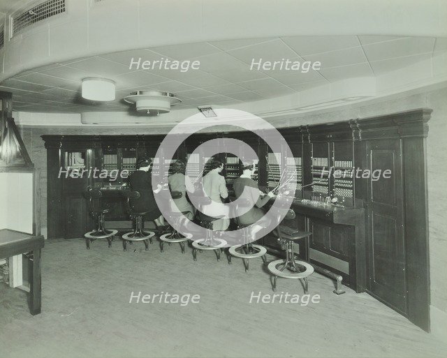 Telephonists at the Fire Brigade Headquarters, Lambeth, London, 1940. Artist: Unknown.
