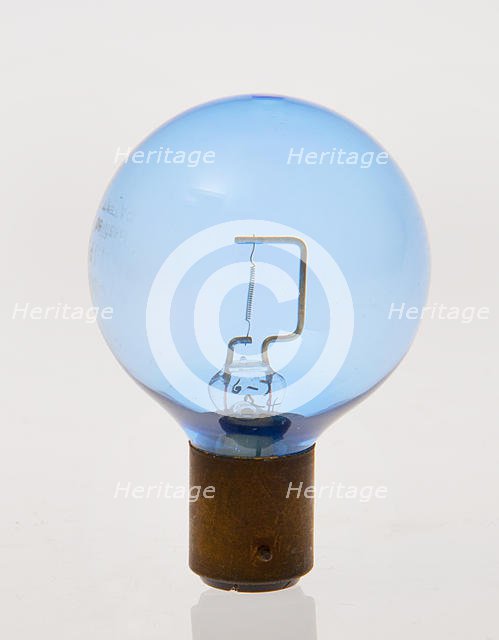 Blue headlamp bulb circa 1930. Creator: Unknown.