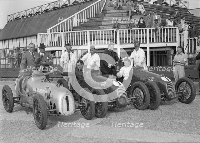 Austin 7 works team, Brooklands 1937. Artist: Bill Brunell.