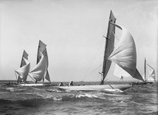 Group of 8 Metres sailing yachts racing downwind, 1911. Creator: Kirk & Sons of Cowes.