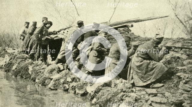 'After the Rains: Serbian Infantry...during the Floods', First World War, c1915, (c1920).  Creator: Unknown.