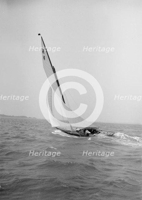 The 7 Metre 'Anitra' sailing with a good wind, 1911. Creator: Kirk & Sons of Cowes.