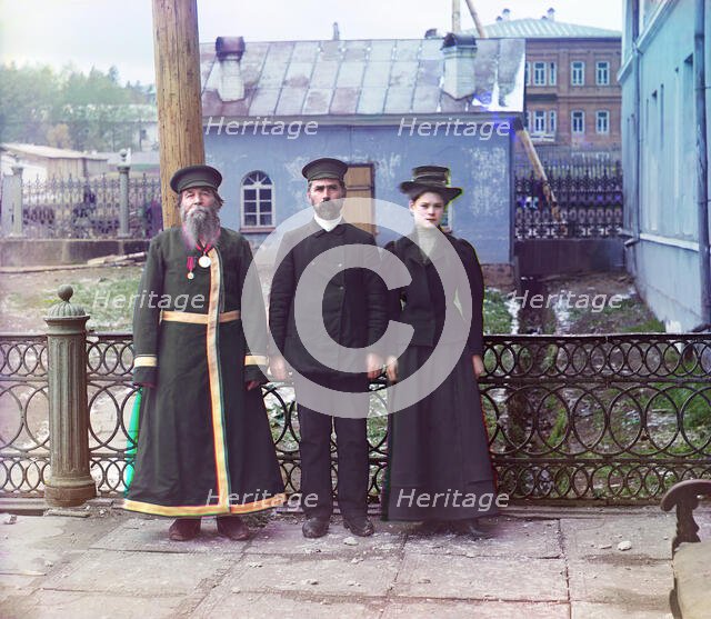 Three generations: A.P. Kalganov with son and granddaughter; the last two work in the shops..., 1910 Creator: Sergey Mikhaylovich Prokudin-Gorsky.