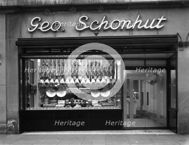 Window of George Schonhut's butcher's shop, Barnsley, South Yorkshire, 1955. Artist: Michael Walters