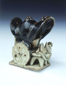 Ox-drawn covered wagon with lady passenger, late Tang dynasty, China, 9th century. Artist: Unknown