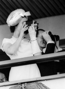 Queen Elizabeth II filming horse racing, Royal Tour of Ghana, Accra, 1961. Artist: Unknown