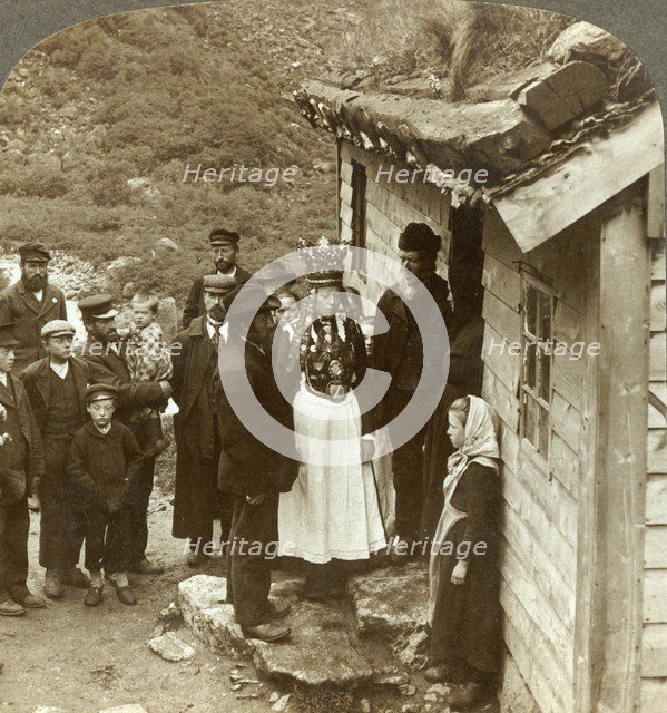 'A Nordfjord bride and groom with guests and parents at house door, Brigsdal, Norway', c1905. Creator: Unknown.