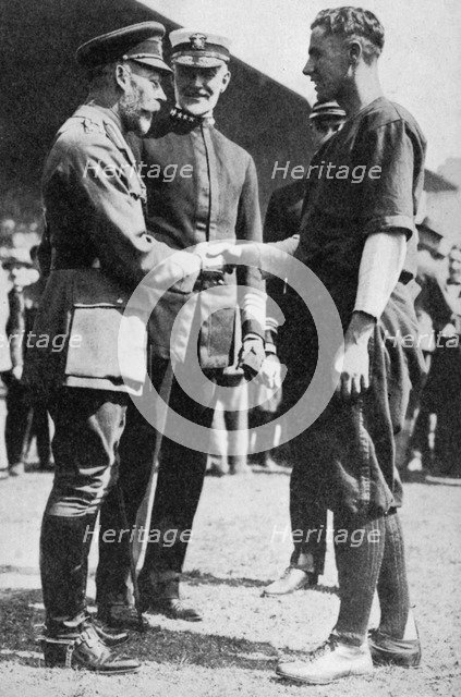 King George V receiving a American soldier who had been playing baseball, c 1910s (1936). Artist: Unknown