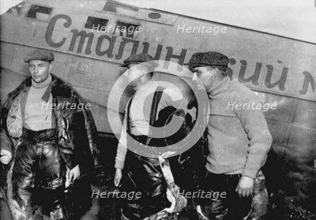 Alexander Belyakov, Georgiy Baidukov and Valery Chkalov by their plane on June 20, 1937. Artist: Anonymous  