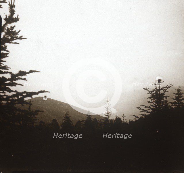Landscape, smoke in distance, Alsace, c1914-c1918. Artist: Unknown.