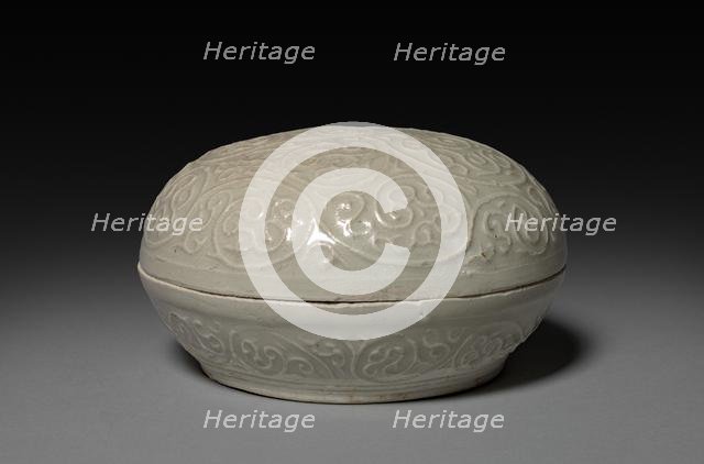 Round Covered Box with Floral Scrolls in Relief: Qingbai type Ware, 1300s. Creator: Unknown.