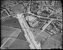 Hazelhurst Cotton Mill and the East Lancashire Road (A580)  under construction, Hazelhurst, c1930s. Creator: Arthur William Hobart.