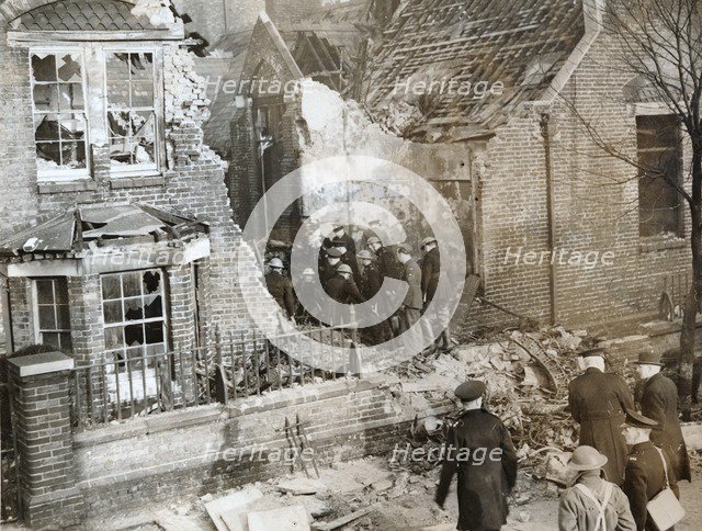 House damaged by a crashed RAF aircraft, Leytonstone, London, World War II, 11 February 1942. Artist: Unknown