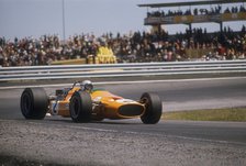 Bruce McLaren's McLaren-Ford, Spanish Grand Prix, Jarama, Madrid, 1968. Artist: Unknown