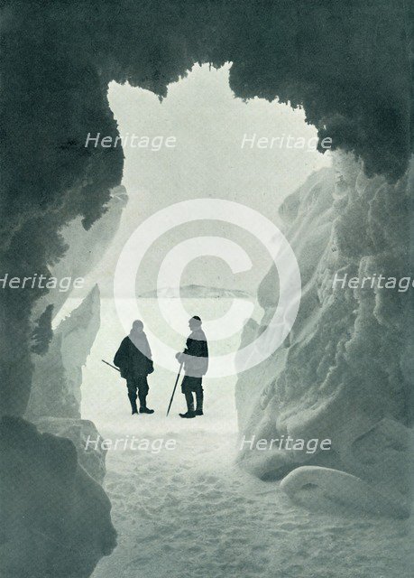 'An Ice Grotto - Tent Island in Distance (Captain Scott and Wright)', c1911, (1913). Artist: Herbert Ponting.