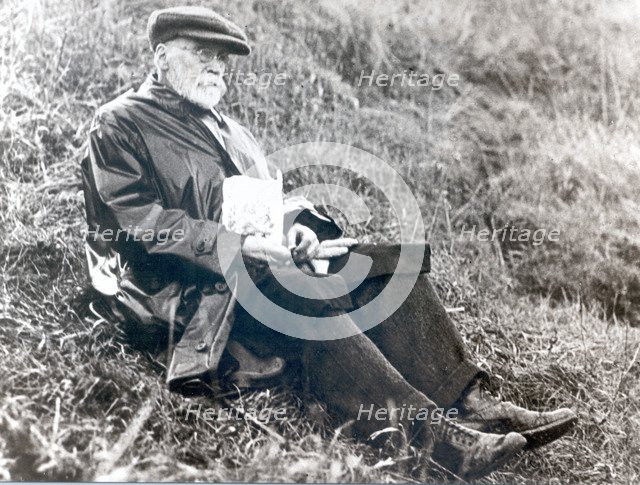 Joseph Rowntree eating lunch on grass at Scarborough, North Yorkshire, 1918. Artist: Unknown