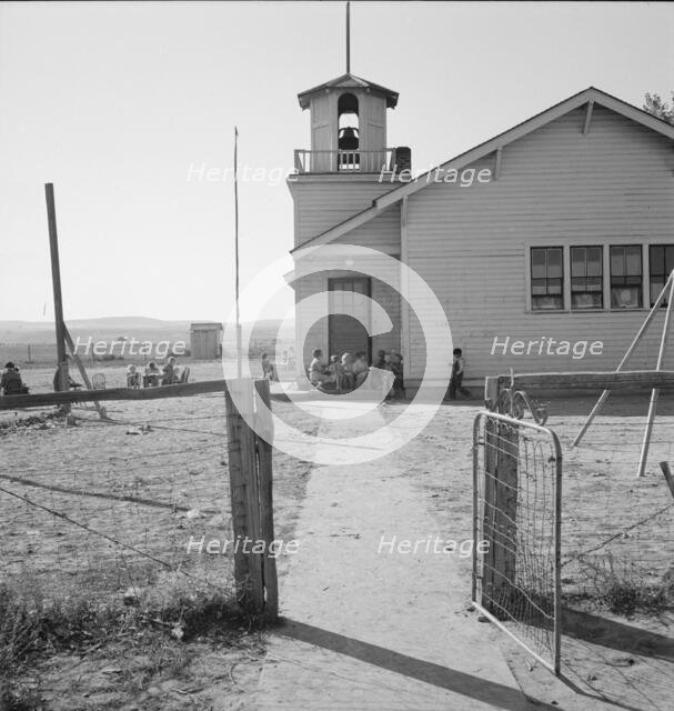 Lincoln Bench School and yard, near Ontario, Malheur County, Oregon, 1939. Creator: Dorothea Lange.