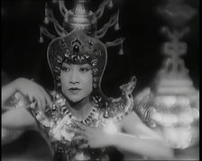 Scene from the Film 'Piccadilly': The Actor Anna May Wong Performing a Chinese Dance in..., 1920s. Creator: British Pathe Ltd.