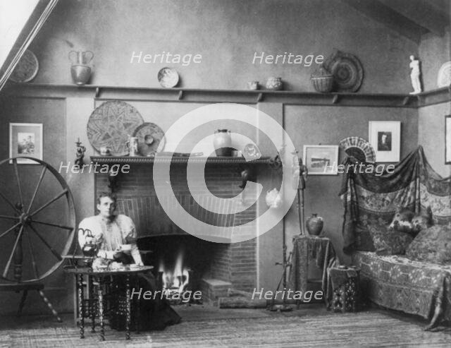 Self-portrait of photographer Frances Benjamin Johnston in her studio at...Washington, D.C., c1900. Creator: Frances Benjamin Johnston.