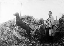 German Officer with his dog in the trenches, c.1914.