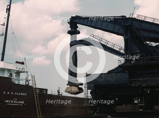 Pennsylvania R.R. ore docks, unloading ore from a lake freighter by means..., Cleveland, Ohio, 1943. Creator: Jack Delano.