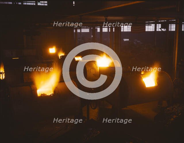 A battery of 1,000 and 2,000 pound furnaces roaring threats to..., Aluminum Industries Inc. , 1942. Creator: Alfred T Palmer.