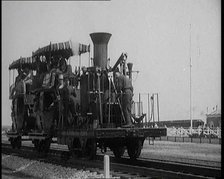 Civilians Wearing Period Costumes Travelling On an Old Locomotive, 1920s. Creator: British Pathe Ltd.