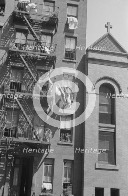 House fronts, 61st Street between 1st and 3rd Avenues, New York, 1938. Creator: Walker Evans.