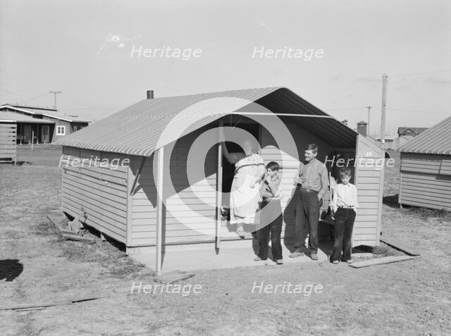 Migrant family from Oklahoma, first occupants of Westley camp, California, 1939. Creator: Dorothea Lange.