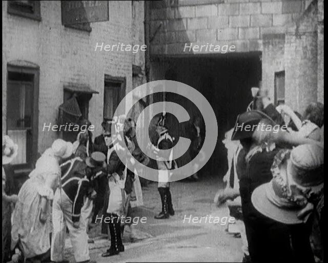 Scene from the Feature Film 'Nelson': Crowds of Actors in Period Costume Being..., 1920s. Creator: British Pathe Ltd.