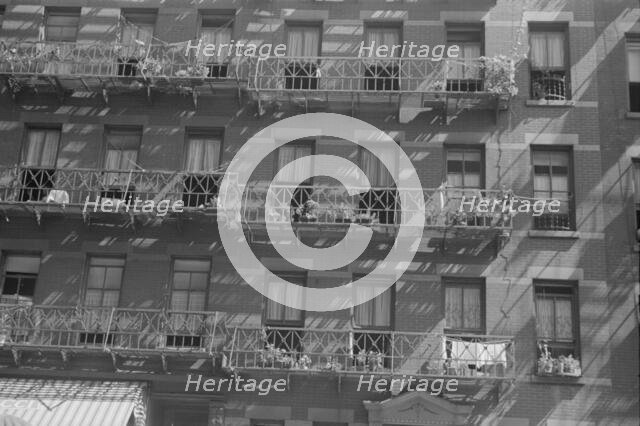 House fronts, 61st Street between 1st and 3rd Avenues, New York, 1938. Creator: Walker Evans.