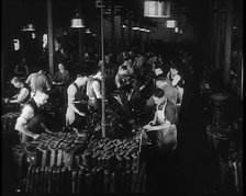 Men Working in a Factory, 1940. Creator: British Pathe Ltd.