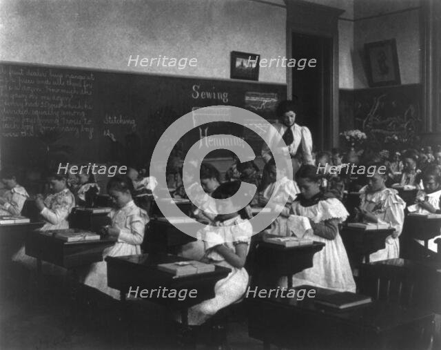 School girls in sewing class, (1899?). Creator: Frances Benjamin Johnston.