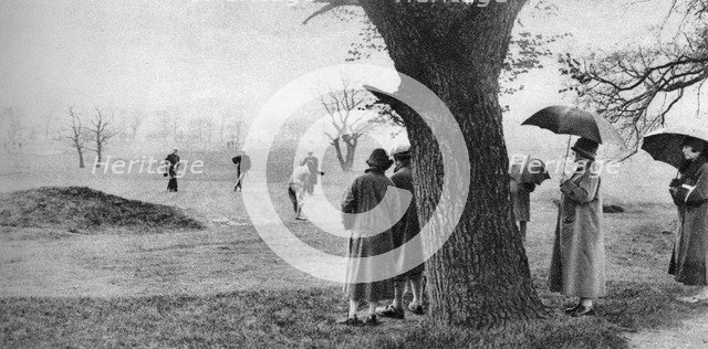 Playing golf on Tooting Bec Common, London, 1926-1927. Artist: Unknown