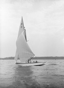 The 7 Metre 'Ancora' (K3) sailing under spinnaker, 1913. Creator: Kirk & Sons of Cowes.