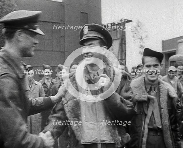 A Male Pilot Shaking Hands with an Officer, 1943-1944. Creator: British Pathe Ltd.