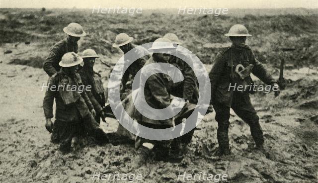 'Red Cross Work in the Flanders Mud', First World War, 1 August 1917, (c1920). Creator: Unknown.