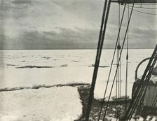 'Pushing Through Heavy Floes In the Ross Sea', c1908, (1909).  Artist: Unknown.