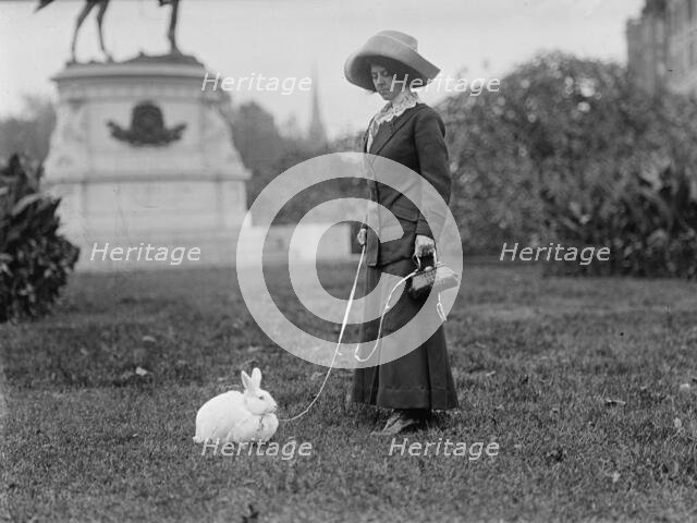 Mrs. J.R. Band with Pet Rabbit, 1911. Creator: Harris & Ewing.