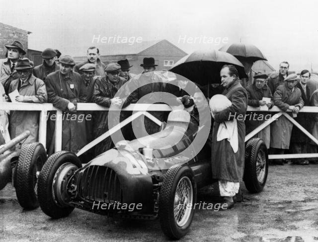 RRA Supercharged Special , G.N. Richardson in paddock at Aintree 1954. Creator: Unknown.