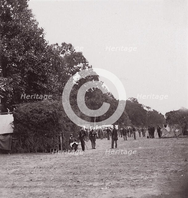 [Encampment alongside a stand of trees]. Brady album, p. 123, 1861-65. Creator: Unknown.