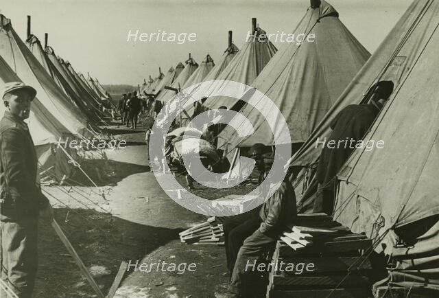 African Americans at Forrest City flood refugee camp, Arkansas, 1930s.  Creators: Farm Security Administration, Edwin Locke.