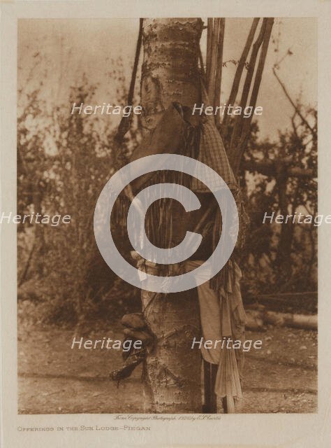 Offerings in the Sun Lodge, Piegan, 1926. Creator: Edward Sheriff Curtis.