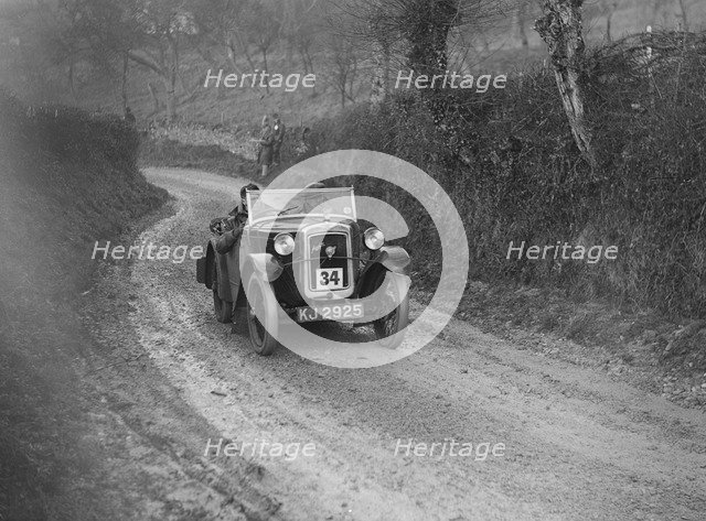 Austin 7 arrow-bodied 2-seater of JS Drewett competing in the NWLMC London-Gloucester Trial, 1931. Artist: Bill Brunell.