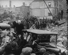 Winston Churchill and Clementine Churchill Driving Through Bombed Out Buildings, 1941. Creator: British Pathe Ltd.