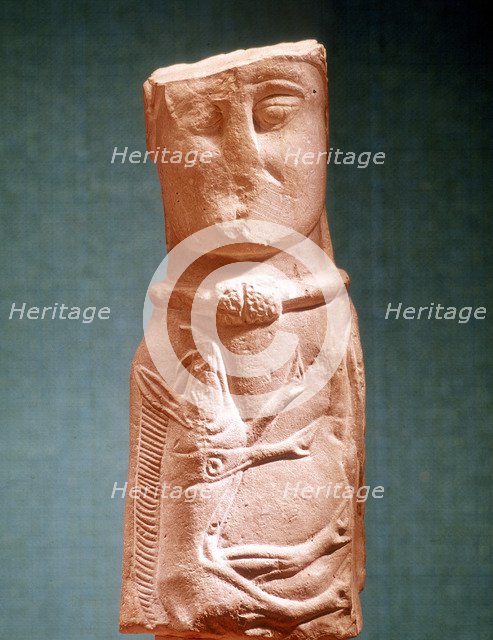 Stone carving of Celtic deity wearing a torque. Artist: Unknown